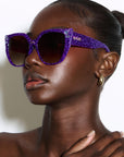 Octoplush ~ oversized rounded purple spotted sunglasses with crystals detail