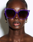 Octoplush ~ oversized rounded purple spotted sunglasses with crystals detail