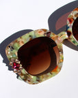 Floria ~ Medium sized square sunglasses in multi acetate with bright crystal flower details