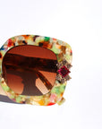 Floria ~ Medium sized square sunglasses in multi acetate with bright crystal flower details