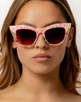 Kaleida ~ Pink two-tone cat-eye sunglasses with star glitter and multi-coloured patterned acetate