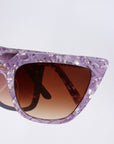 Lavara ~ Sharp cat-eye sunglasses in lilac marble with micro crystal detailing