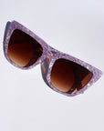 Lavara ~ Sharp cat-eye sunglasses in lilac marble with micro crystal detailing