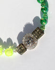 NEON DARLING ~ Handmade necklace with fluoro faceted beads with small pearls and emerald green beads and a crystal centrepiece