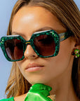 Paradise ~ Oversized oval sunglasses in emerald marble acetate with green crystal detailing