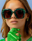 Paradise ~ Oversized oval sunglasses in emerald marble acetate with green crystal detailing