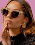 Queenie ~ Two-toned cat-eye sunglasses in gold glitter and translucent black polkadot acetate