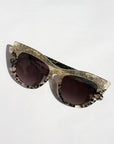 Queenie ~ Two-toned cat-eye sunglasses in gold glitter and translucent black polkadot acetate