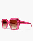 Rosinite ~ Oversized pink oval sunglasses in glitter acetate with fuchsia crystal detailing