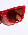 Rubie ~ Sharp cat-eye sunglasses in red marble with micro crystal detailing