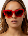 Rubie ~ Sharp cat-eye sunglasses in red marble with micro crystal detailing