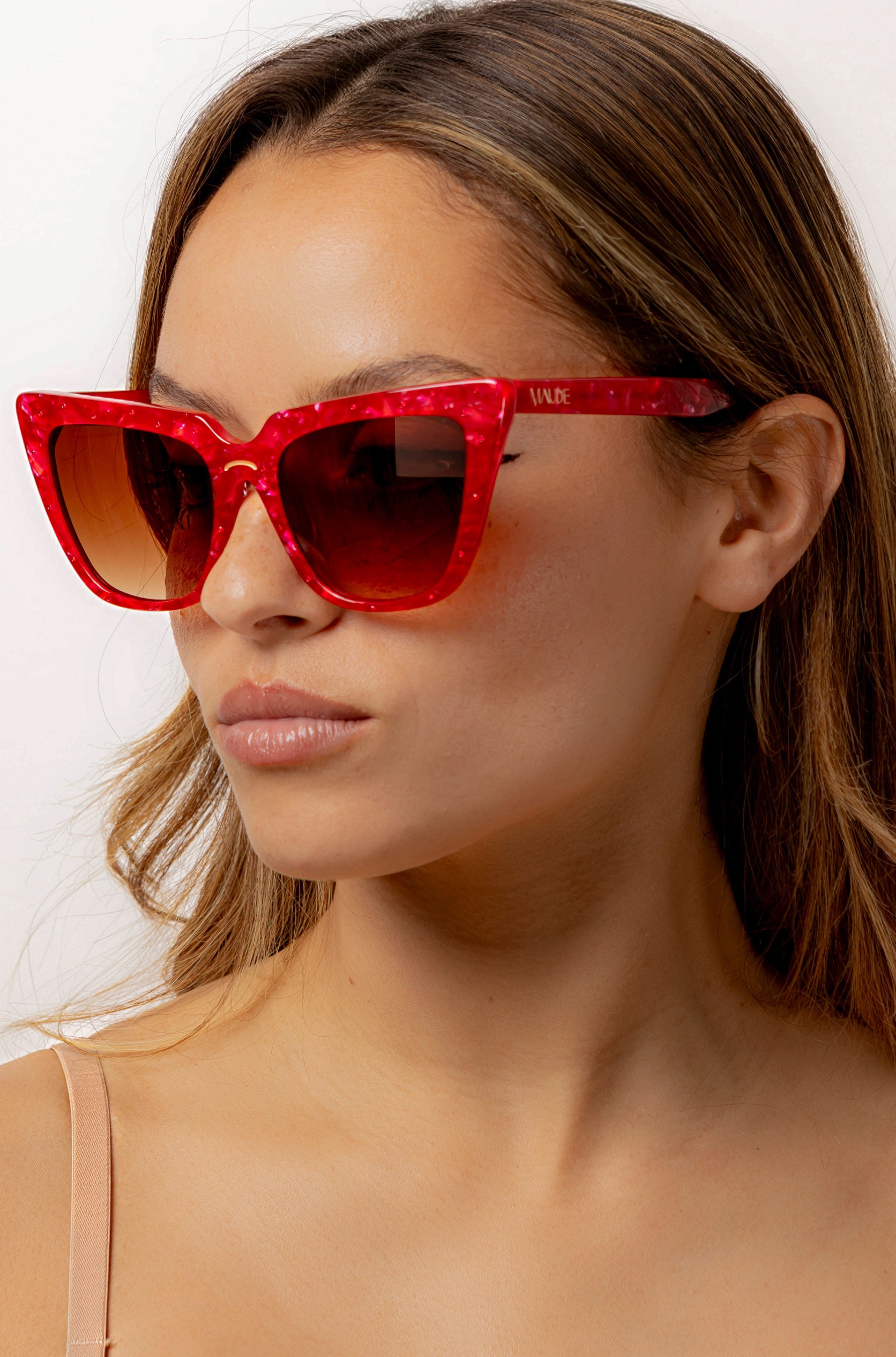 Rubie ~ Sharp cat-eye sunglasses in red marble with micro crystal detailing