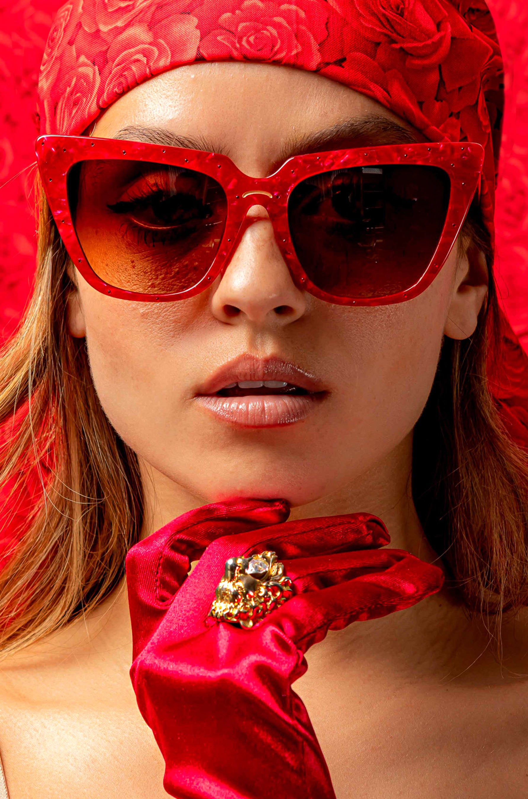 Rubie ~ Sharp cat-eye sunglasses in red marble with micro crystal detailing