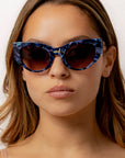Saphira ~ Almond-shaped sunglasses in marbled blue shimmer acetate