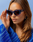 Saphira ~ Almond-shaped sunglasses in marbled blue shimmer acetate