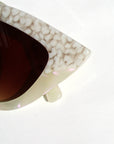 Shell ~ Two-tone cat-eye sunglasses in white bubble print and mother of pearl acetate