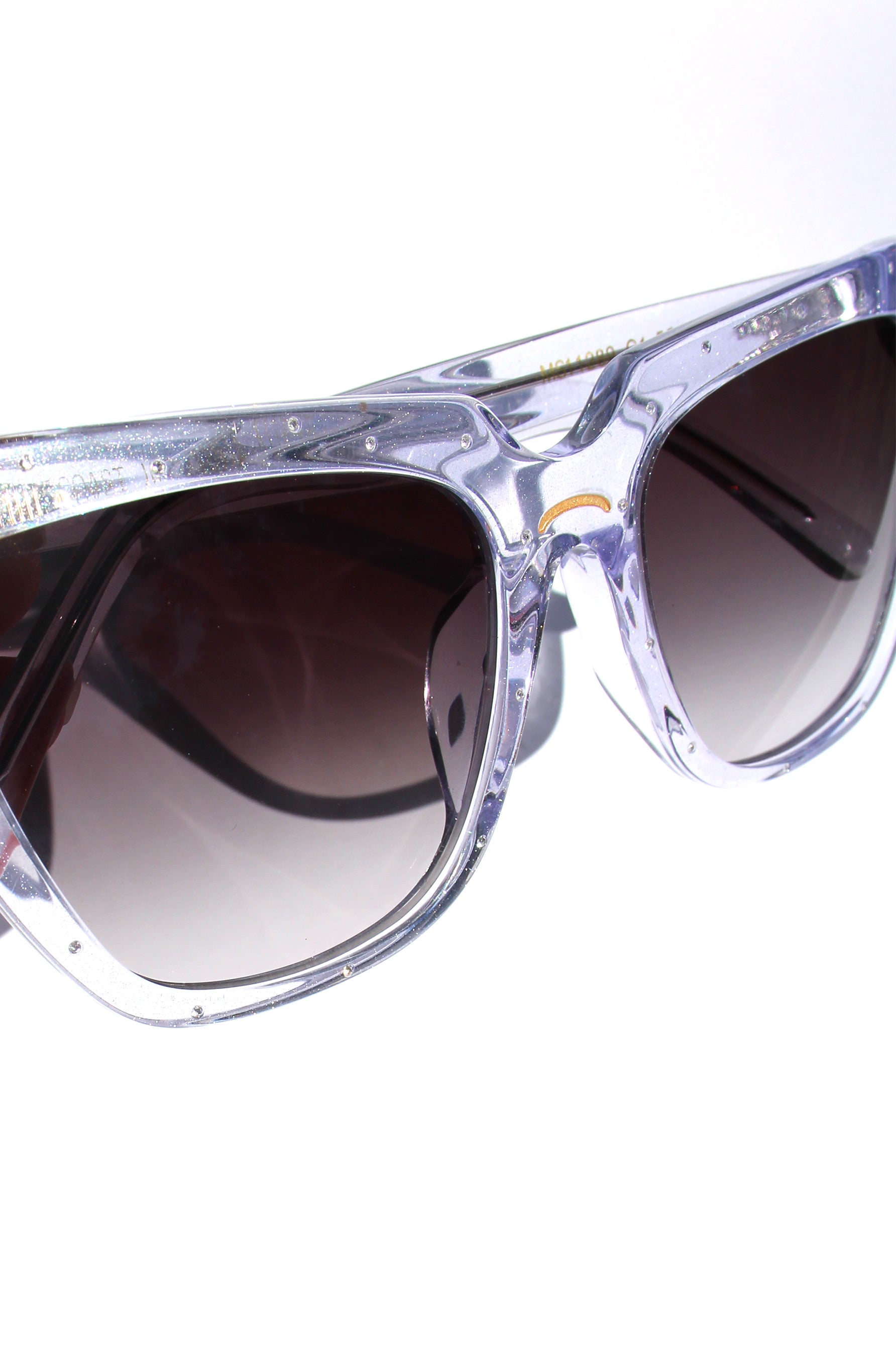 Stardust ~ Sharp cat-eye sunglasses in pearl tortoise shell with micro opal crystal detailing