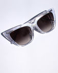 Stardust ~ Sharp cat-eye sunglasses in pearl tortoise shell with micro opal crystal detailing