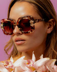Aftersun ~ Medium sized square sunglasses in brown acetate with golden shimmer and bold crystal flower details