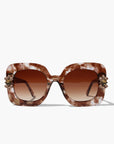 Aftersun ~ Medium sized square sunglasses in brown acetate with golden shimmer and bold crystal flower details