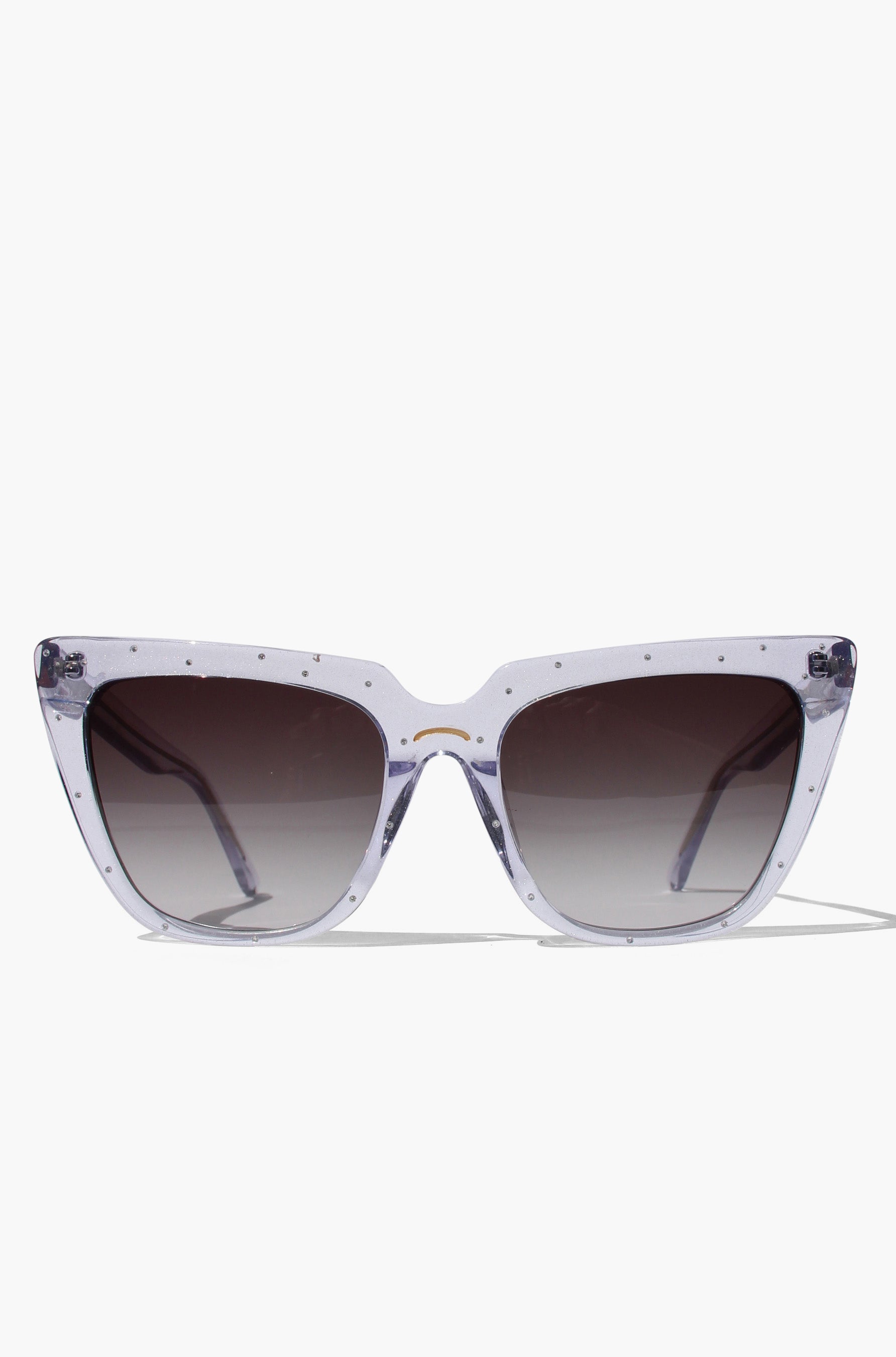 Stardust ~ Sharp cat-eye sunglasses in clear shimmer with micro