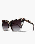 Tortelle ~ Sharp cat-eye sunglasses in pearl tortoise shell with micro opal crystal detailing