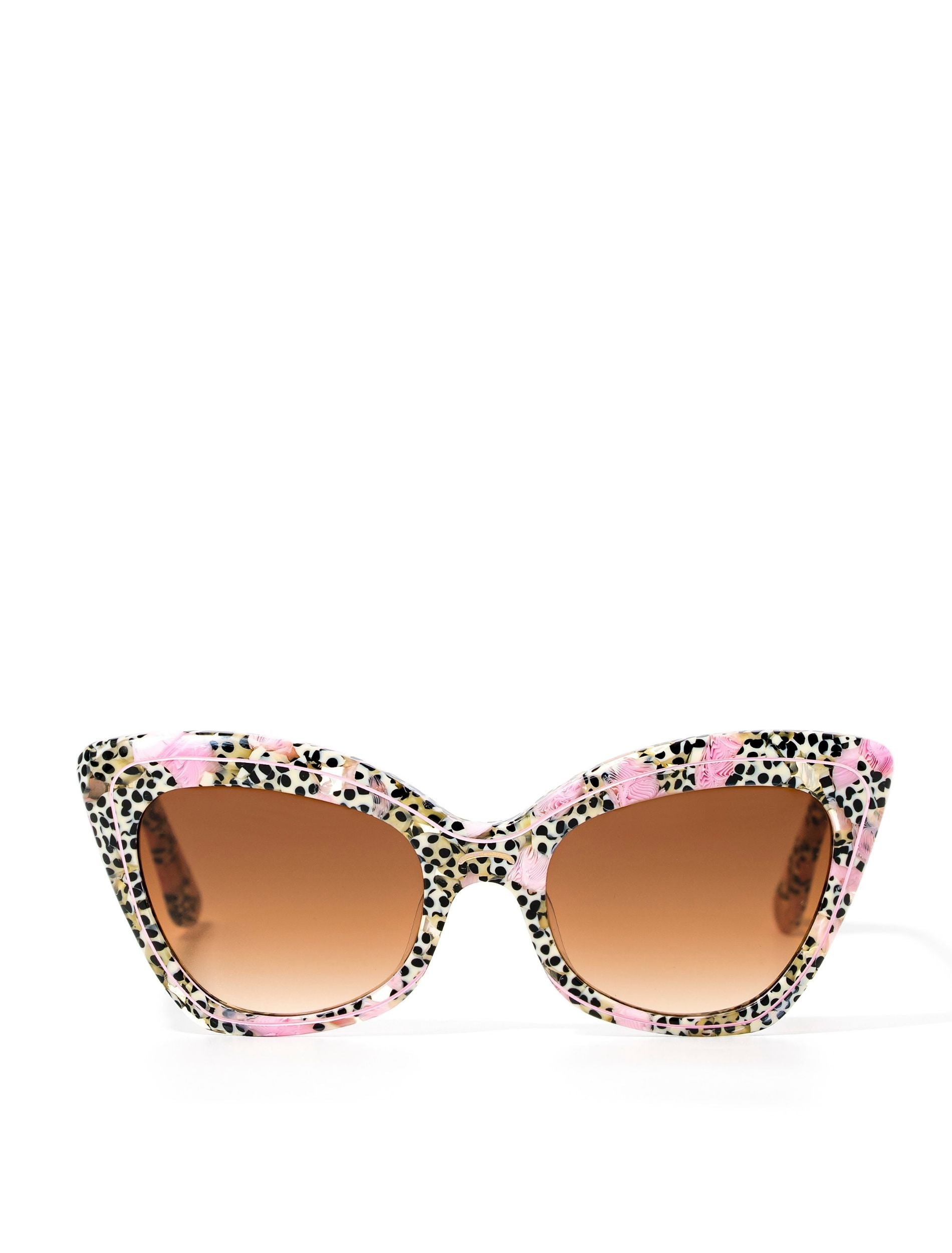 Front view of a stylish cat eye sunglasses featuring a chic leopard print and a brown gradient lense