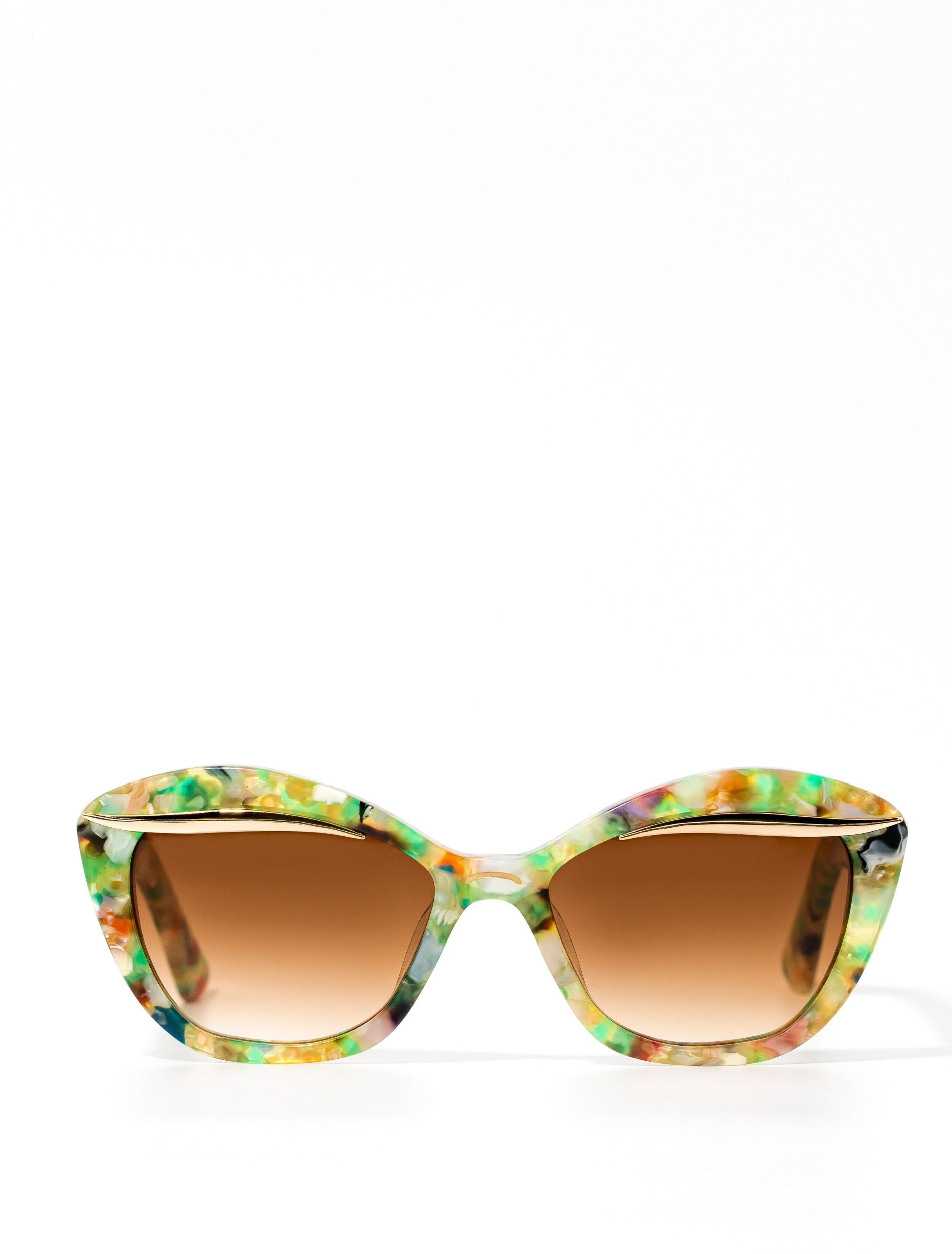 Colorful cat-eye sunglasses with gradient brown lenses on a white background.