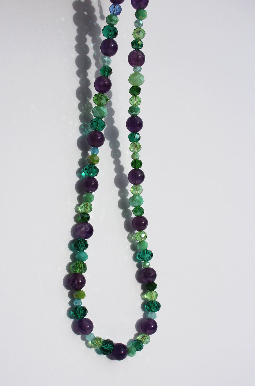 AMYLETTE ~ Handmade necklace with amethyst stones with emerald, turquoise and green rondelle crystal beads