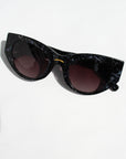 Black Pearl ~ Black almond-shaped acetate sunglasses with subtle dark shimmer