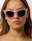 Chandalie ~ Sharp two-tone cat-eye sunglasses in iridescent glitter and silver sparkle acetate