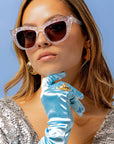 Chandalie ~ Sharp two-tone cat-eye sunglasses in iridescent glitter and silver sparkle acetate