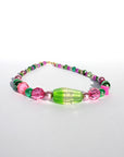 GUAVA GLOW ~ Handmade statement necklace featuring a green glitter centrepiece with emerald green and fuchsia beads
