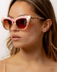 Kaleida ~ Pink two-tone cat-eye sunglasses with star glitter and multi-coloured patterned acetate