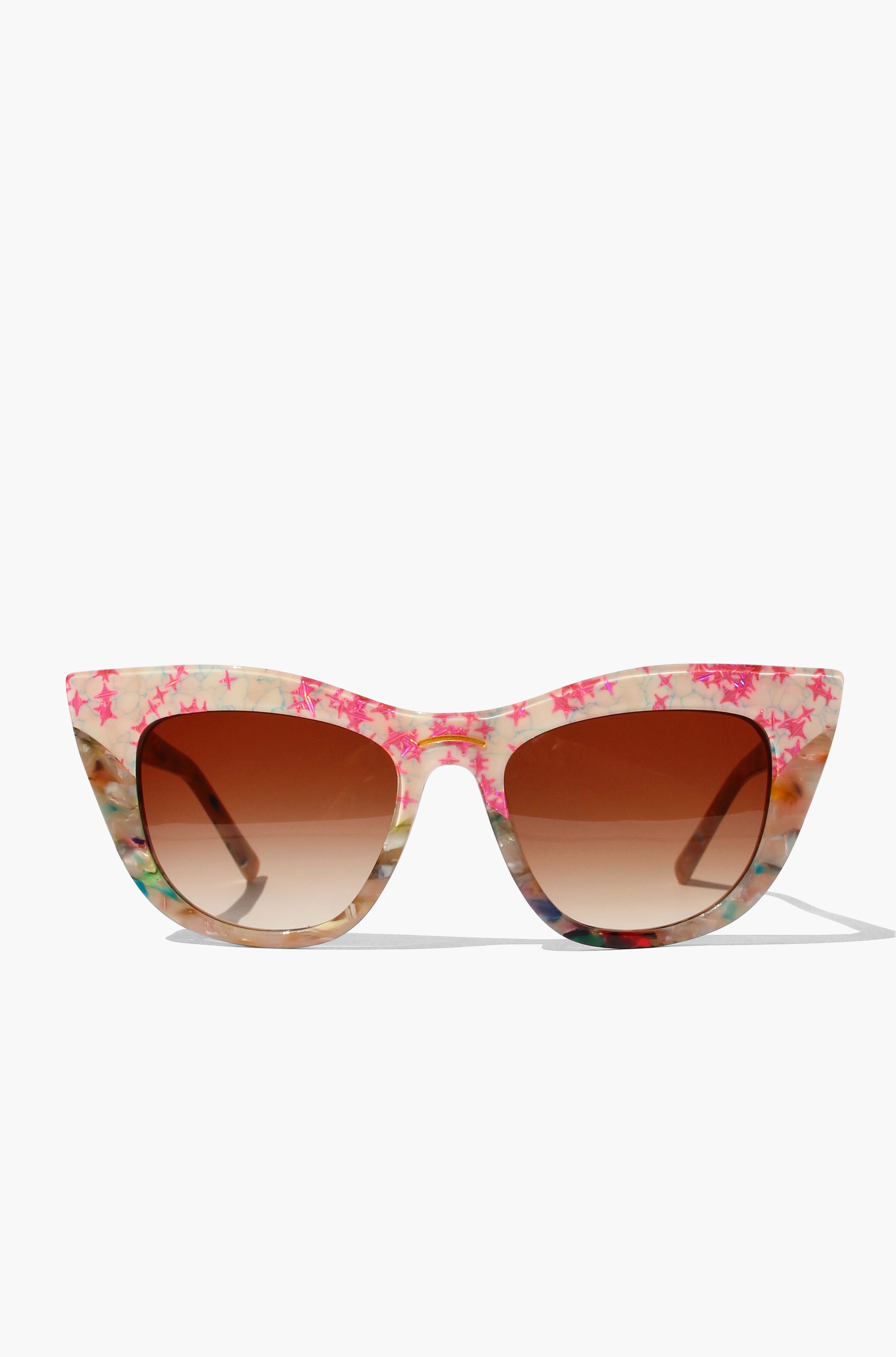 Floral patterned cat-eye sunglasses on a white background