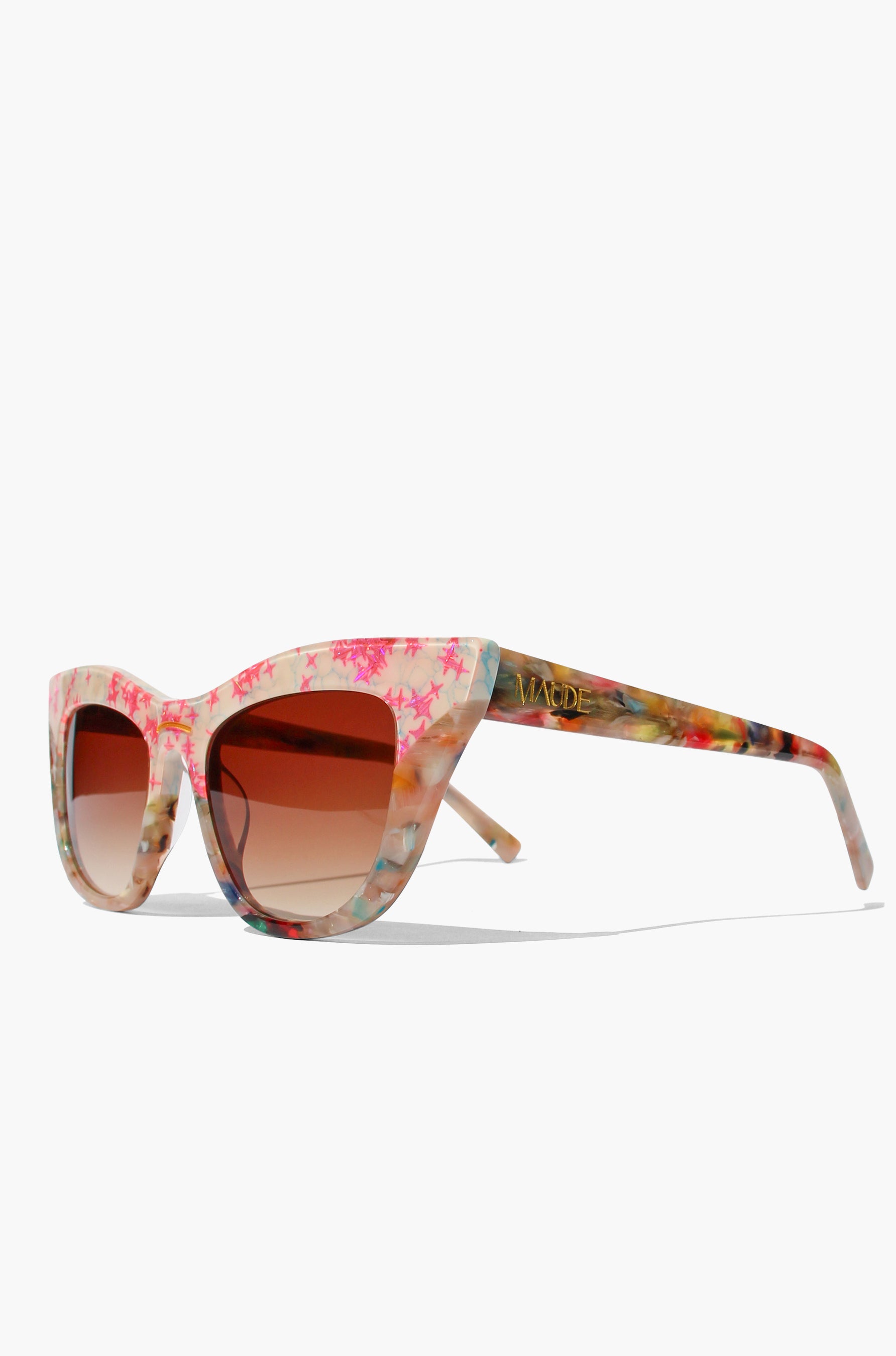 Floral-patterned sunglasses with a white background