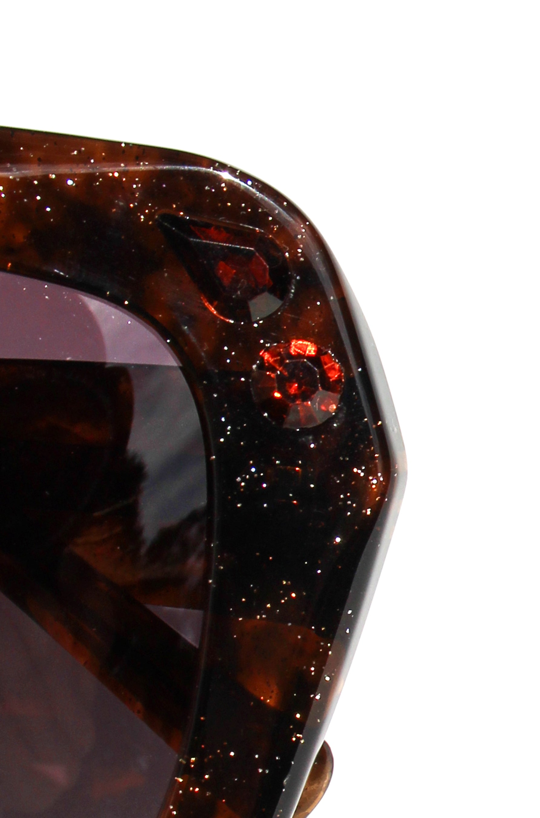 Tigers Eye ~ Oversized oval sunglasses in silver glitter tort acetate with coffee crystal detailing