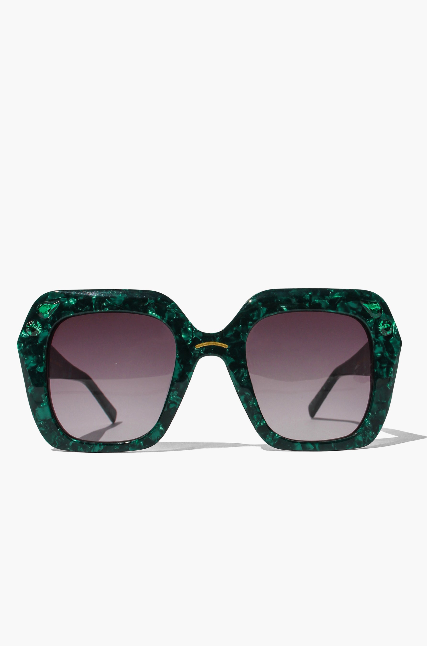 Green marbled sunglasses with dark lenses on a white background