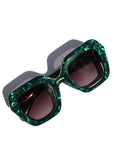 Paradise ~ Oversized oval sunglasses in emerald marble acetate with green crystal detailing