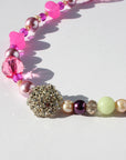 PLUMBPOP ~ Handmade statement necklace with crystal centrepiece, freshwater pearls, golden shadow rondelle crystal beads and various pink beads