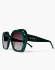 Green sunglasses with a brand name on a white background