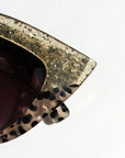 Queenie ~ Two-toned cat-eye sunglasses in gold glitter and translucent black polkadot acetate