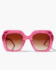Rosinite ~ Oversized pink oval sunglasses in glitter acetate with fuchsia crystal detailing