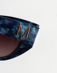 Saphira ~ Almond-shaped sunglasses in marbled blue shimmer acetate