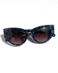 Saphira ~ Almond-shaped sunglasses in marbled blue shimmer acetate