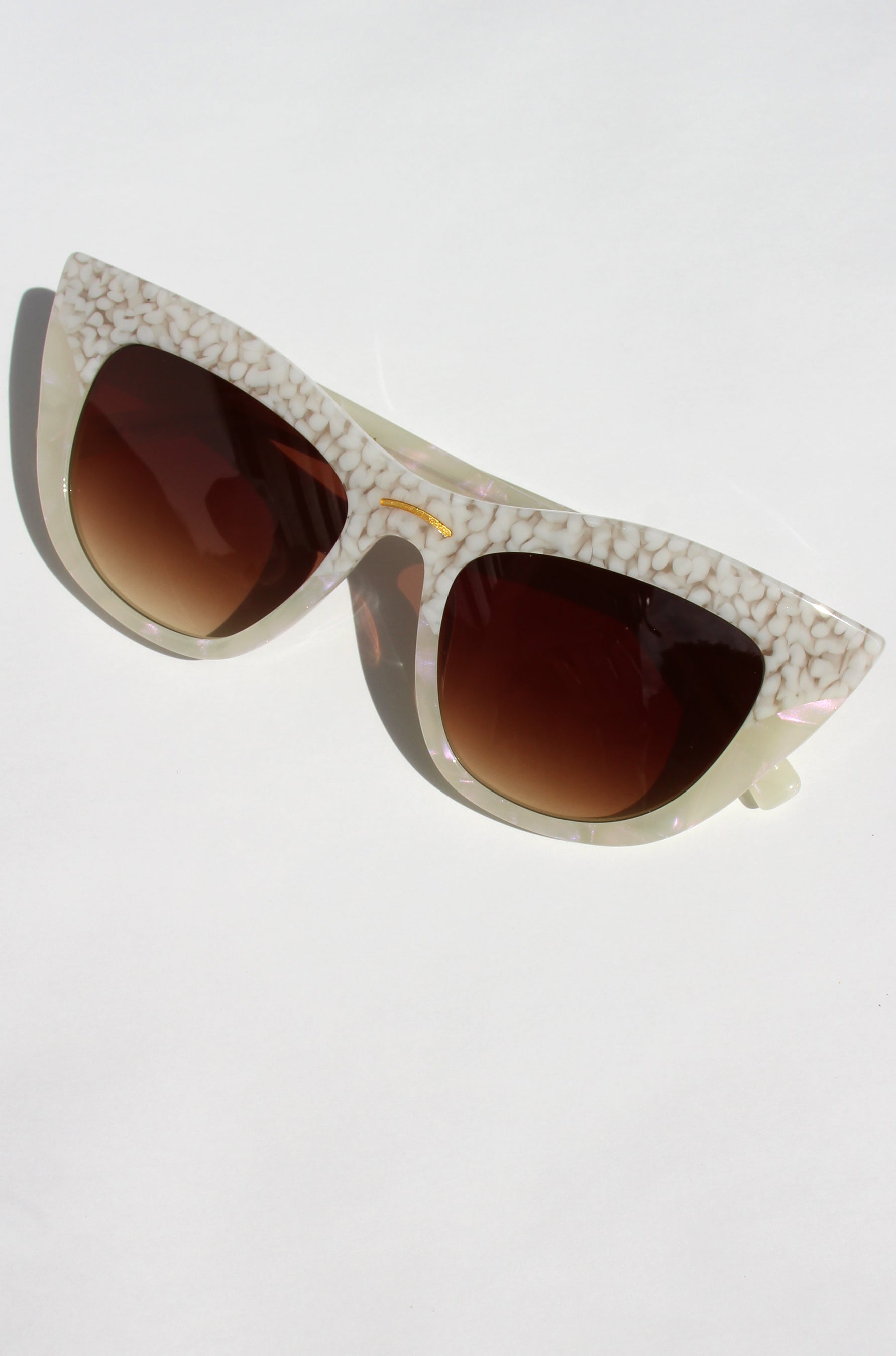 Shell ~ Two-tone cat-eye sunglasses in white bubble print and mother of pearl acetate