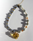 STARGLOW ~ Handmade yellow crystal heart necklace with reflective beads, crystal-rondelle-beads-and-sea-green-natural-pearls