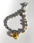 STARGLOW ~ Handmade yellow crystal heart necklace with reflective beads, crystal-rondelle-beads-and-sea-green-natural-pearls