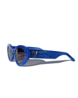 AZURIA ~ Oval shaped sunglasses in a luminous imperial blue with pink shimmer