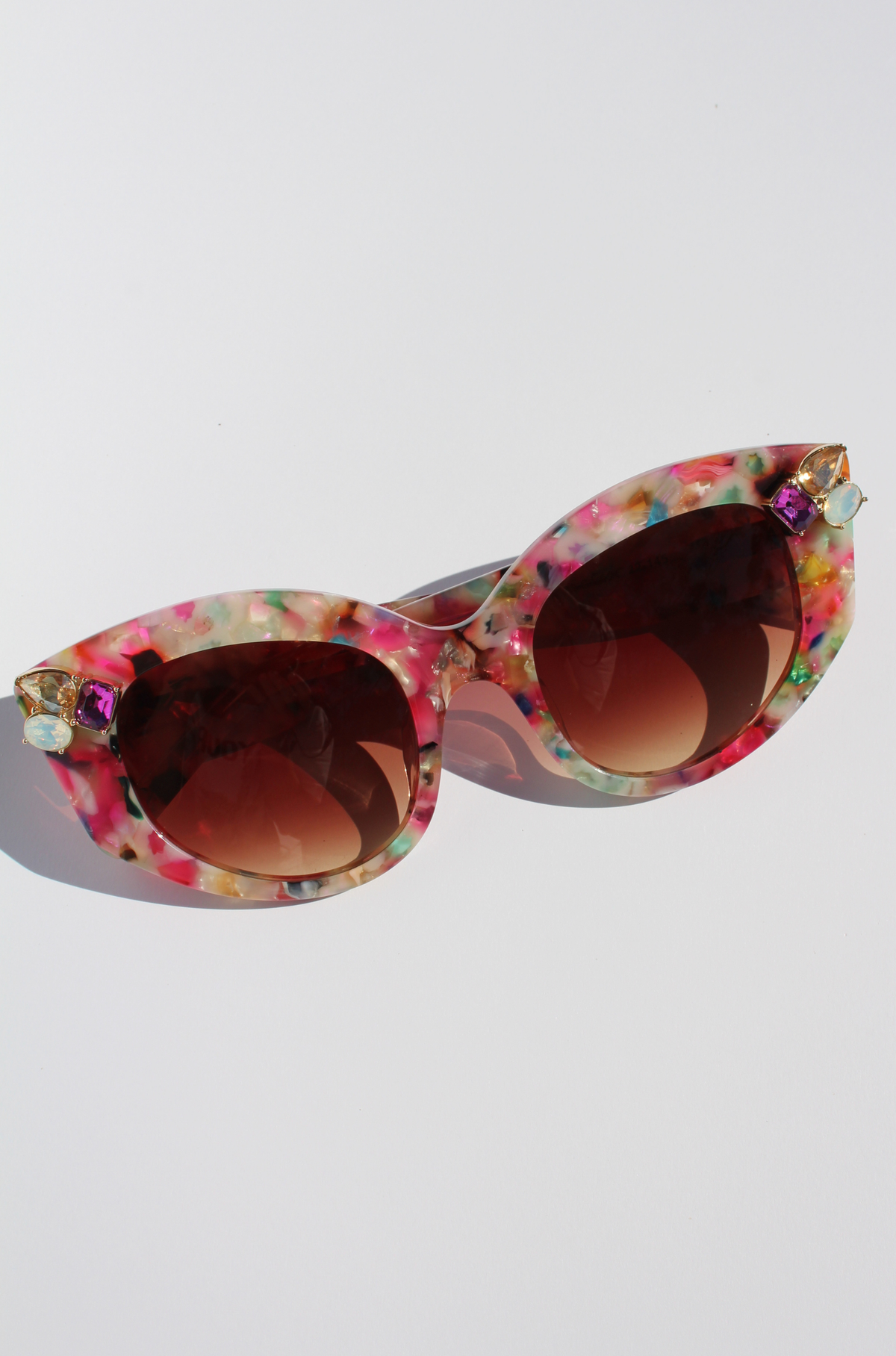 CALYPSO ~ Modern cateye sunglasses in a vibrant multicoloured acetate with crystal embellishments